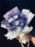 Preserved purple roses bouquet